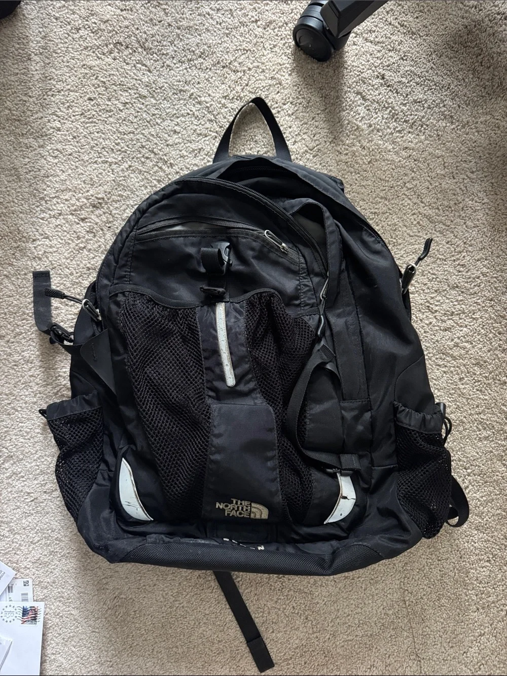 The North Face Black Backpack with Mesh Pockets